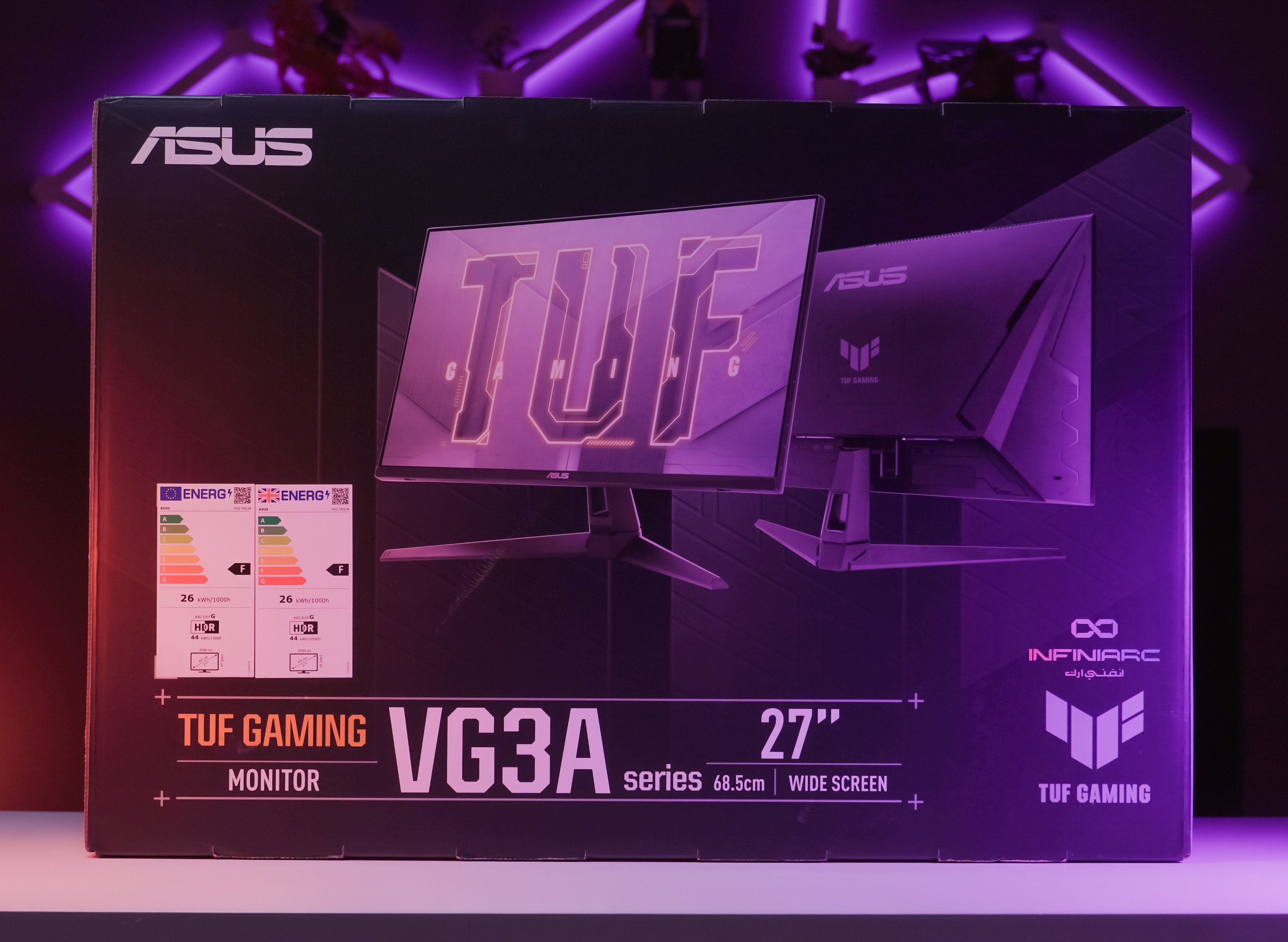 واجهة صندوق شاشة ASUS TUF VG27AQ3A وشعار إنفيني آرك.